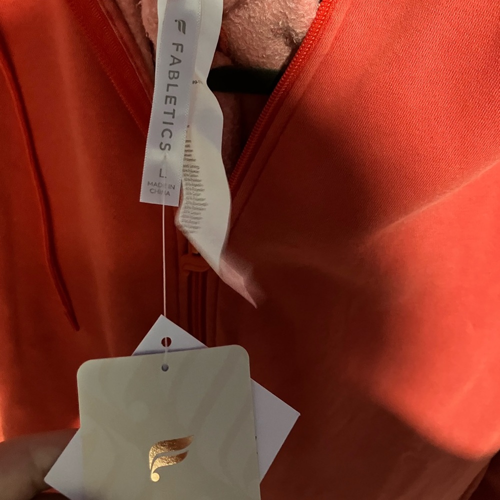 Fabletics forever fleece hooded red-orange onesie
